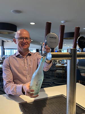 Daragh Murphy, Executive Manager of Palm Beach Surf Club using Purezza