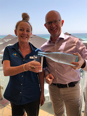 Daragh Murphy, Executive Manager of Palm Beach Surf Club using pouring Purezza water